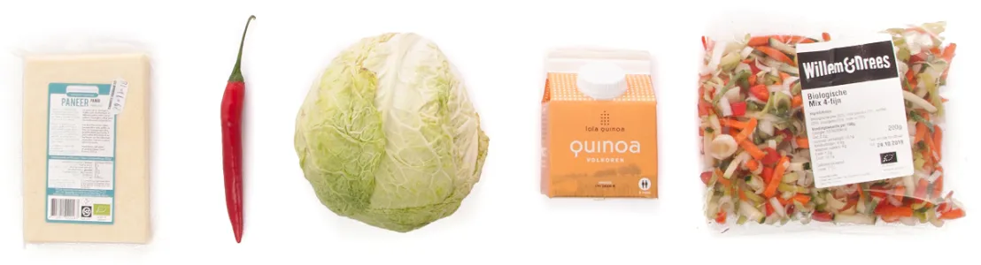 De ingrediënten voor het paneer met gebakken savooiekool gerecht