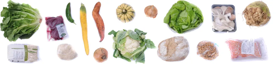 Producten uit deze maaltijdbox naast elkaar zoals sla, vis en bloemkool