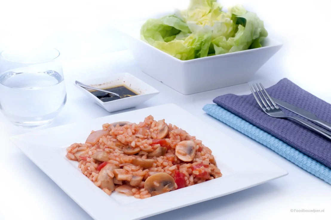 Het gerecht op ons bord is de risotto met tomaten