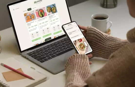 Nieuwe website van Ekomenu op laptop en mobiel
